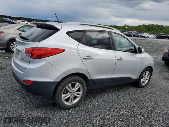 2013 Hyundai Tucson GLS with VIN KM8JU3AC1DU709937, listed as a Copart auction lot 52716295 with 181,711 mi miles and Salvage Title. Bid and sale history available at carsss.com. Image 3.