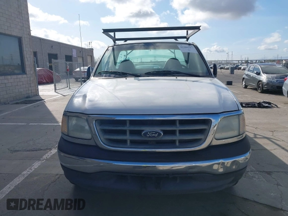2000 Ford F-150 XL with VIN 1FTRF17WXYKA72880, listed as a IAAI auction lot 41989317 with 149,967 mi miles. Bid and sale history available at carsss.com. Image 12.