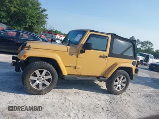 2013 Jeep Wrangler Arctic z VIN 1C4GJWBG2DL634942, wystawiony jako IAAI lot #42373239 z przebiegiem 131 470 mil mil oraz . Historia ofert i sprzedaży dostępna na DreamBid. Obrazek 15.