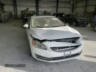 2015 Volvo S60 T5 Platinum with VIN YV1612TM8F2352980, listed as a Copart auction lot 82701654 with 0 mi miles and Salvage Title. Bid and sale history available at carsss.com. Image 11.