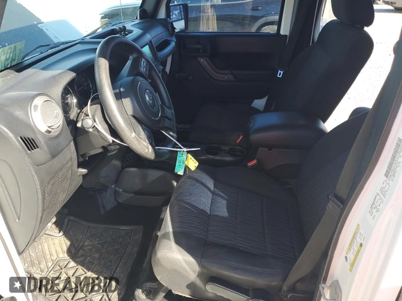 2012 Jeep Wrangler Unlimited Sport with VIN 1C4BJWDG2CL257437, listed as a Copart auction lot 49257965 with 141,695 mi miles and Clean title. Bid and sale history available at DreamBid. Image 7.