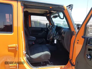 2012 Jeep Wrangler Unlimited Sport RHD with VIN 1C4BJWKGXCL221613, listed as a IAAI auction lot 42327004 with 129,375 mi miles and . Bid and sale history available at DreamBid. Image 5.