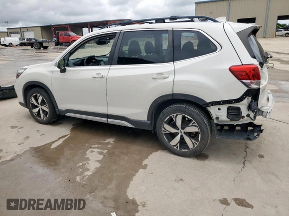 2020 Subaru Forester Touring with VIN JF2SKAXC3LH431111, listed as a Copart auction lot 60539515 with 88,853 mi miles and Salvage title. Bid and sale history available at DreamBid. Image 2.