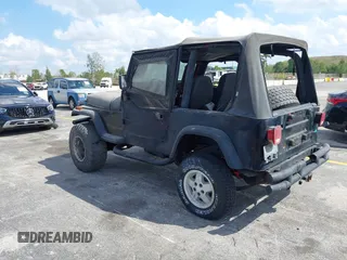 1994 Jeep Wrangler S with VIN 1J4FY19P7RP418580, listed as a IAAI auction lot 41899026 with 196,430 mi miles. Bid and sale history available at carsss.com. Image 3.