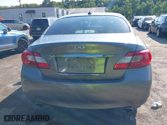 2012 Infiniti M with VIN JN1BY1AR3CM394274, listed as a IAAI auction lot 42687322 with 117,258 mi miles and . Bid and sale history available at DreamBid. Image 16.
