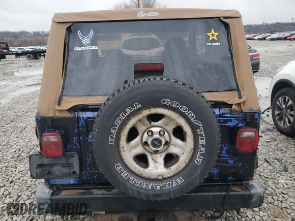 1998 Jeep Wrangler Sport with VIN 1J4FY19S5WP707201, listed as a Copart auction lot 86632884 with 0 mi miles and Salvage Title. Bid and sale history available at carsss.com. Image 6.