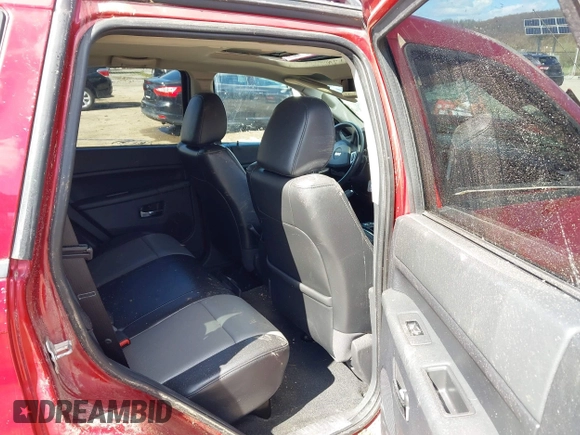 2010 Jeep Grand Cherokee Laredo with VIN 1J4PR4GK9AC143199, listed as a IAAI auction lot 41972153 with 81,896 mi miles. Bid and sale history available at carsss.com. Image 8.