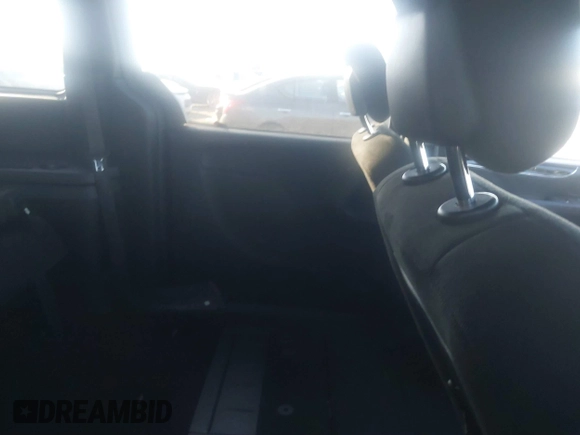 2016 Dodge Grand Caravan SE with VIN 2C4RDGBG1GR357895, listed as a IAAI auction lot 41389733 with 131,175 mi miles and . Bid and sale history available at DreamBid. Image 8.