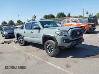 2022 Toyota Tacoma SR with VIN 3TMCZ5AN0NM489420, listed as a IAAI auction lot 42597175 with 129,340 mi miles and . Bid and sale history available at DreamBid. Image 1.