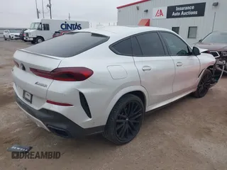 2021 BMW X6 M50i z VIN 5UXCY8C01M9E51506, wystawiony jako IAAI lot #41538726 z przebiegiem Nie podano mil oraz . Historia ofert i sprzedaży dostępna na DreamBid. Obrazek 4.