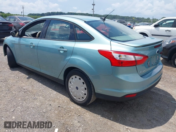 2012 Ford Focus SE with VIN 1FAHP3F2XCL240934, listed as a IAAI auction lot 42673102 with 188,658 mi miles and . Bid and sale history available at DreamBid. Image 3.