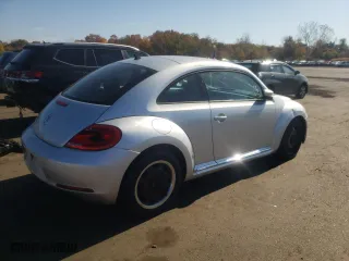 2012 Volkswagen Beetle 2.5L w/Sun PZEV with VIN 3VWJP7AT1CM601448, listed as a Copart auction lot 76889874 with 240,606 mi miles and Clean Title. Bid and sale history available at carsss.com. Image 3.