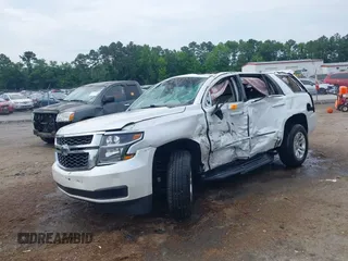 2019 Chevrolet Tahoe LT with VIN 1GNSKBKC3KR144850, listed as a IAAI auction lot 42420199 with Not provided miles and . Bid and sale history available at DreamBid. Image 18.