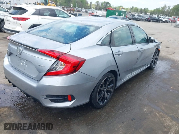 2021 Honda Civic Sport with VIN 2HGFC2F88MH530214, listed as a IAAI auction lot 41968361 with 60,869 mi miles and . Bid and sale history available at DreamBid. Image 4.