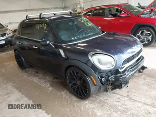 2011 MINI Countryman S with VIN WMWZC3C52BWM25644, listed as a IAAI auction lot 42820876 with 102,481 mi miles and . Bid and sale history available at DreamBid. Image 1.