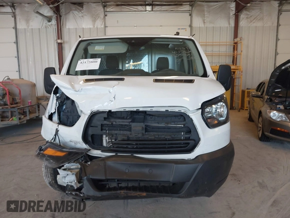2019 Ford Transit with VIN 1FTYE1YM0KKB77849, listed as a IAAI auction lot 42175880 with 151,828 mi miles. Bid and sale history available at carsss.com. Image 11.