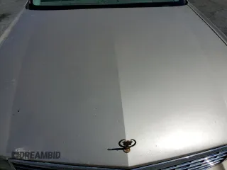 1995 Cadillac DeVille z VIN 1G6KD52B6SU274827, wystawiony jako Copart lot #41902125 z przebiegiem Nie podano mil oraz Szkoda całkowita • Salvage title. Historia ofert i sprzedaży dostępna na DreamBid. Obrazek 12.