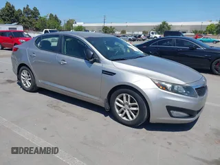2013 Kia Optima LX with VIN KNAGM4A72D5399117, listed as a IAAI auction lot 42174312 with 105,661 mi miles and . Bid and sale history available at carsss.com. Image 1.