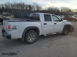 2006 Mitsubishi Raider Duro Cross with VIN 1Z7HT38N36S579031, listed as a Copart auction lot 87695435 with 117,098 mi miles and Salvage Title. Bid and sale history available at carsss.com. Image 3.