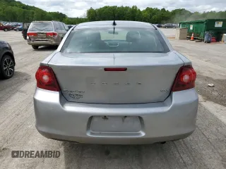 2013 Dodge Avenger SXT z VIN 1C3CDZCB0DN548175, wystawiony jako Copart lot #56795655 z przebiegiem 128 460 mil mil oraz Szkoda całkowita • Salvage title. Historia ofert i sprzedaży dostępna na DreamBid. Obrazek 6.