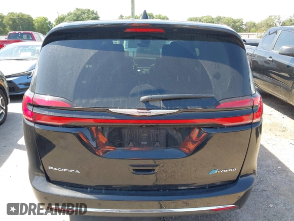 2024 Chrysler Pacifica Hybrid Select z VIN 2C4RC1S73RR185310, wystawiony jako IAAI lot #42246006 z przebiegiem 31 696 mil mil oraz . Historia ofert i sprzedaży dostępna na DreamBid. Obrazek 16.