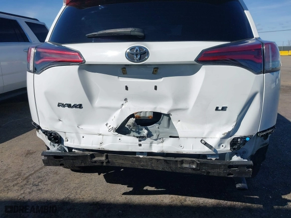 2018 Toyota RAV4 LE with VIN 2T3ZFREV8JW467744, listed as a IAAI auction lot 41818614 with 95,609 mi miles. Bid and sale history available at carsss.com. Image 6.