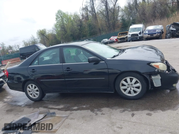 2004 Toyota Camry LE with VIN 4T1BF30K34U080477, listed as a IAAI auction lot 41956998 with 135,441 mi miles. Bid and sale history available at carsss.com. Image 13.