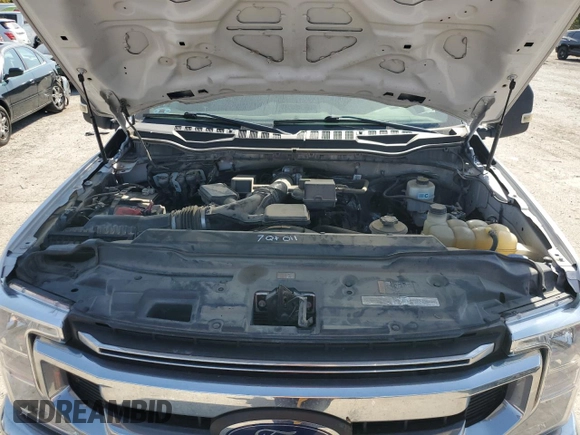 2021 Ford F-350 XL with VIN 1FT8W3B6XMEE13167, listed as a Copart auction lot 75465194 with 103,368 mi miles and Salvage Title. Bid and sale history available at DreamBid. Image 12.