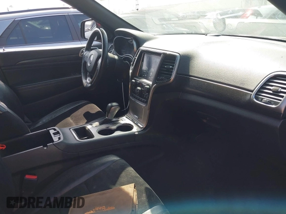2018 Jeep Grand Cherokee Altitude with VIN 1C4RJEAG0JC433654, listed as a IAAI auction lot 42057867 with 103,552 mi miles and . Bid and sale history available at DreamBid. Image 5.