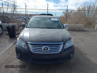2009 Toyota Avalon XL with VIN 4T1BK36B59U325810, listed as a IAAI auction lot 41337809 with 184,476 mi miles and . Bid and sale history available at carsss.com. Image 12.