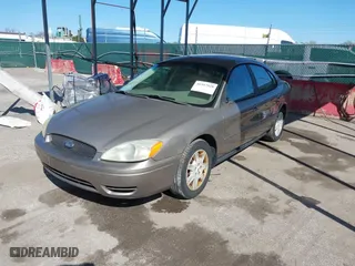 2006 Ford Taurus SE with VIN 1FAHP53266A118054, listed as a IAAI auction lot 41957528 with 131,955 mi miles. Bid and sale history available at carsss.com. Image 17.
