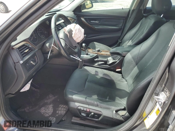 2014 BMW 3 Series 328i with VIN WBA3A5G56ENP33167, listed as a Copart auction lot 61406885 with 125,967 mi miles and Salvage title. Bid and sale history available at DreamBid. Image 7.