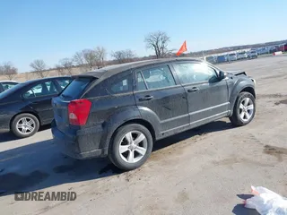 2010 Dodge Caliber SXT with VIN 1B3CB4HA4AD651946, listed as a IAAI auction lot 41771139 with 165,663 mi miles and . Bid and sale history available at DreamBid. Image 4.