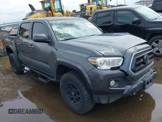 2021 Toyota Tacoma SR5 with VIN 3TMAZ5CN3MM151268, listed as a IAAI auction lot 42102438 with 76,524 mi miles and . Bid and sale history available at DreamBid. Image 1.