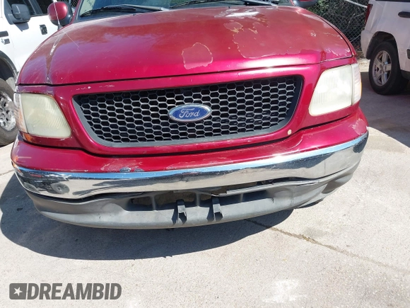 2002 Ford F-150 XL with VIN 1FTRX17W02KB40270, listed as a IAAI auction lot 42573017 with Not provided miles and . Bid and sale history available at DreamBid. Image 6.