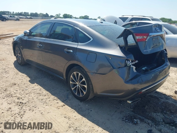 2018 Toyota Avalon XLE with VIN 4T1BK1EB1JU285770, listed as a IAAI auction lot 42073553 with 71,809 mi miles and . Bid and sale history available at DreamBid. Image 3.