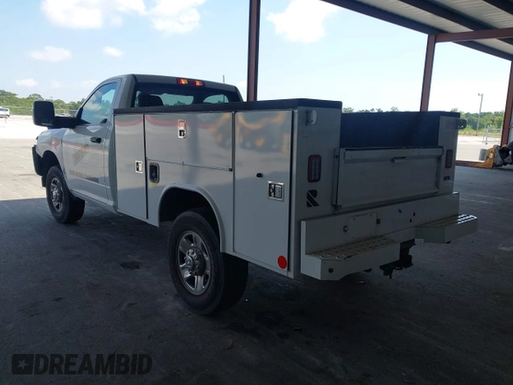 2023 Ram 2500 with VIN 3C7WR5AJ7PG567772, listed as a IAAI auction lot 42180314 with 48,197 mi miles and . Bid and sale history available at DreamBid. Image 3.