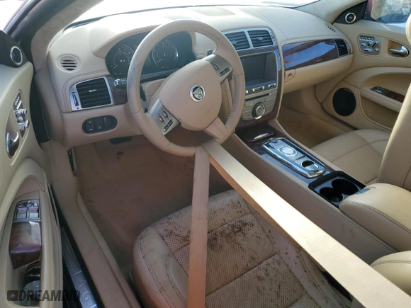 2010 Jaguar XK with VIN SAJWA4GB5ALB36814, listed as a Copart auction lot 74855444 with 0 mi miles and Salvage Title. Bid and sale history available at carsss.com. Image 8.
