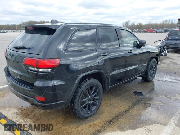 2018 Jeep Grand Cherokee Laredo with VIN 1C4RJFAG7JC468391, listed as a IAAI auction lot 42010443 with 91,585 mi miles and . Bid and sale history available at DreamBid. Image 4.