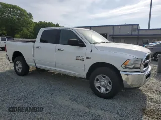 2015 Ram 2500 with VIN 3C6TR4DT4FG573333, listed as a Copart auction lot 54758515 with 182,000 mi miles and Salvage title. Bid and sale history available at DreamBid. Image 4.