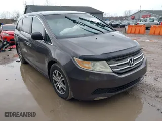 2011 Honda Odyssey EX-L with VIN 5FNRL5H66BB094068, listed as a IAAI auction lot 41935126 with 144,772 mi miles. Bid and sale history available at carsss.com. Image 1.