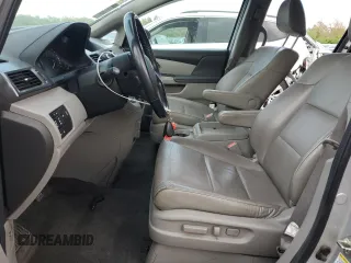 2014 Honda Odyssey Touring with VIN 5FNRL5H93EB034263, listed as a Copart auction lot 57254485 with 150,084 mi miles and Salvage title. Bid and sale history available at DreamBid. Image 7.
