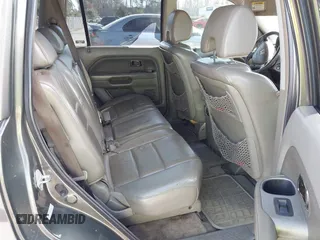 2006 Honda Pilot EX-L with VIN 2HKYF18786H506289, listed as a IAAI auction lot 41507906 with 283,470 mi miles and . Bid and sale history available at DreamBid. Image 8.