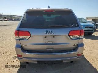 2014 Jeep Grand Cherokee Overland with VIN 1C4RJFCG7EC153156, listed as a Copart auction lot 52452925 with 152,348 mi miles and Salvage Title. Bid and sale history available at DreamBid. Image 6.