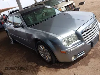 2007 Chrysler 300 C with VIN 2C3KA63H67H859243, listed as a IAAI auction lot 41874867 with 169,191 mi miles. Bid and sale history available at carsss.com. Image 1.