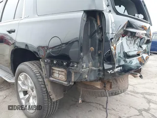 2015 GMC Yukon SLT with VIN 1GKS1BKC3FR129173, listed as a IAAI auction lot 41795585 with 97,893 mi miles. Bid and sale history available at carsss.com. Image 19.