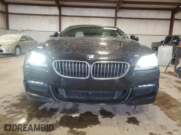2015 BMW 6 Series 640i xDrive z VIN WBA6B8C58FD453159, wystawiony jako Copart lot #88931285 z przebiegiem 145 656 mil mil oraz Szkoda całkowita • Salvage title. Historia ofert i sprzedaży dostępna na DreamBid. Obrazek 5.