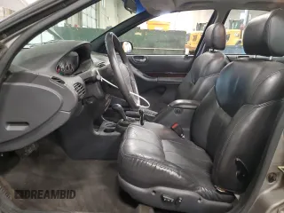 1999 Chrysler Cirrus LXi z VIN 1C3EJ56H4XN528008, wystawiony jako Copart lot #80166314 z przebiegiem 127 767 mil mil oraz Tytuł czysty. Historia ofert i sprzedaży dostępna na DreamBid. Obrazek 7.