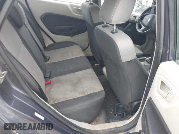 2013 Ford Fiesta S z VIN 3FADP4AJ9DM175576, wystawiony jako IAAI lot #42449969 z przebiegiem 123 959 mil mil oraz . Historia ofert i sprzedaży dostępna na DreamBid. Obrazek 8.