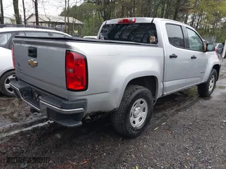 2020 Chevrolet Colorado 2WD Work Truck with VIN 1GCGSBEA5L1142784, listed as a IAAI auction lot 41983363 with 121,734 mi miles. Bid and sale history available at carsss.com. Image 4.
